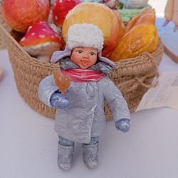 Мальчик с петушком в ушанке