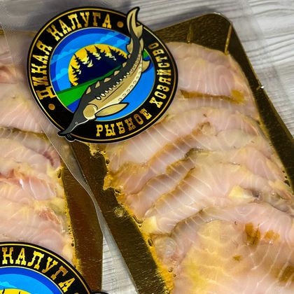 Осетр холодного копчения нарезка Осетр холодного копчения нарезка