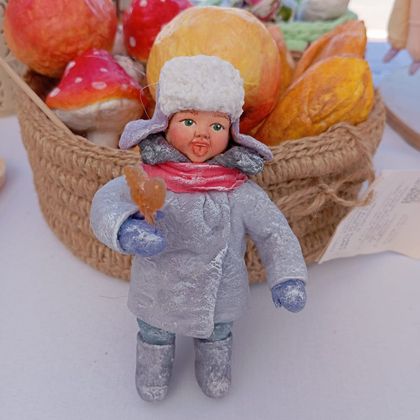 Мальчик с петушком в ушанке